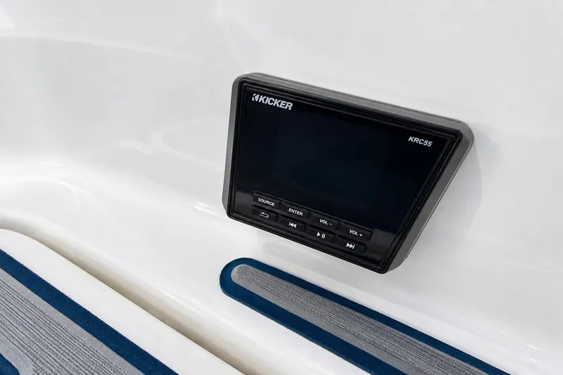 Slide: The Image of Kicker audio control panel on 2022 Tahoe 2150 boat dashboard. - 35