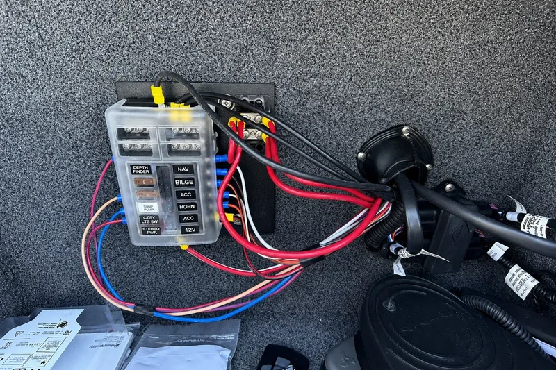 Slide: The Image of Electrical panel with wiring in a 2022 Tahoe 2150 boat. - 17