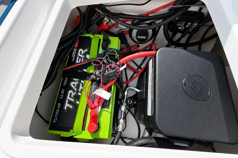 Slide: The Image of Battery compartment of 2022 Tahoe 2150 boat with Tracker lithium battery and wiring. - 43