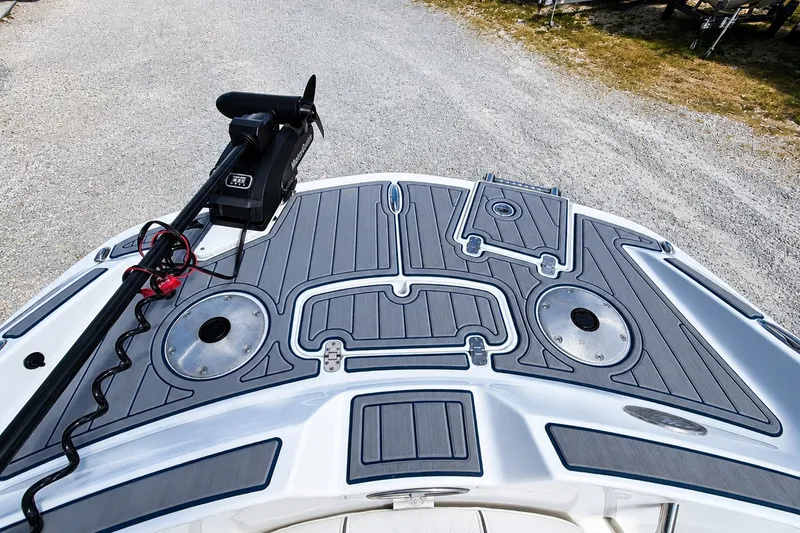 Slide: The Image of 2022 Tahoe 2150 boat deck with trolling motor, featuring sleek design and durable materials. - 26