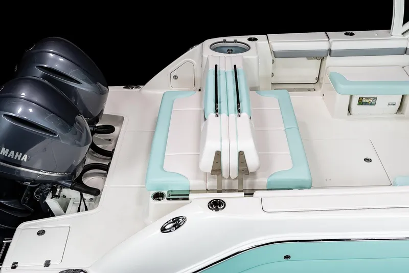 Slide: The Image of Manufacturer Provided Image: 2025 Robalo R317 Dual Console boat with Yamaha engines, featuring spacious seating and modern design. - 13