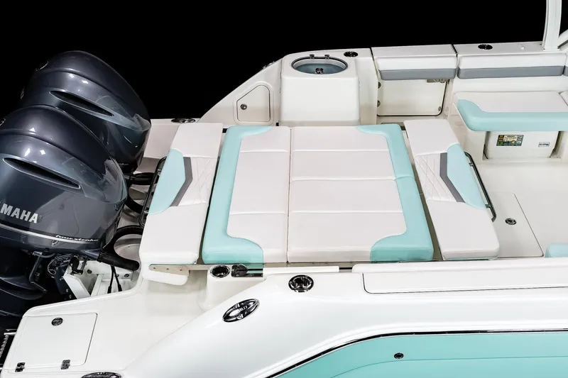 Slide: The Image of Manufacturer Provided Image: 2025 Robalo R317 Dual Console boat with Yamaha engines and spacious seating area. - 14