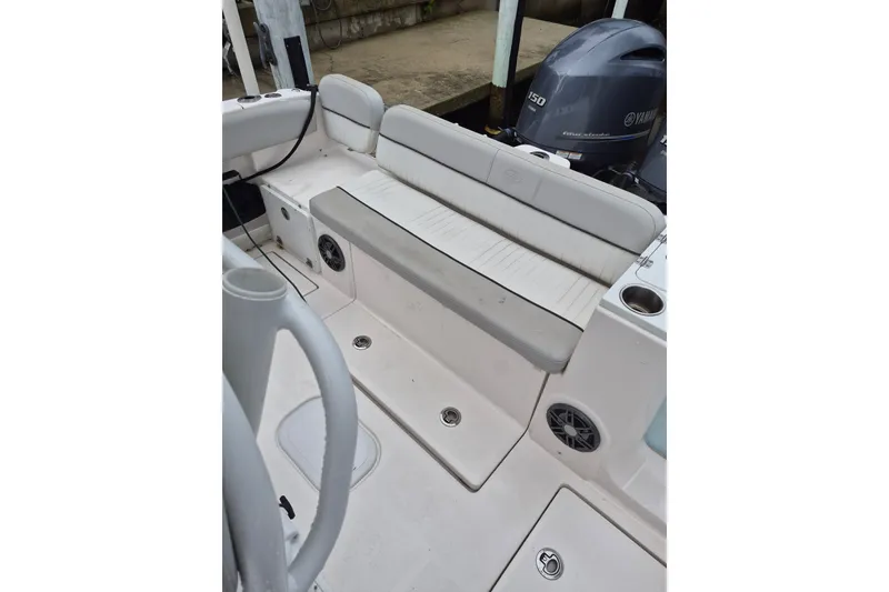 Slide: The Image of 2023 Sea Fox 268 Commander boat interior with seating and Yamaha engine. - 22