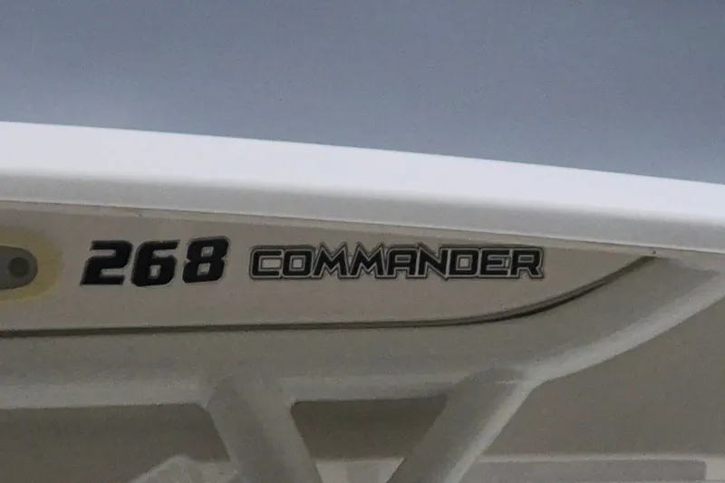 Slide: The Image of 2023 Sea Fox 268 Commander boat logo on white hull. - 26