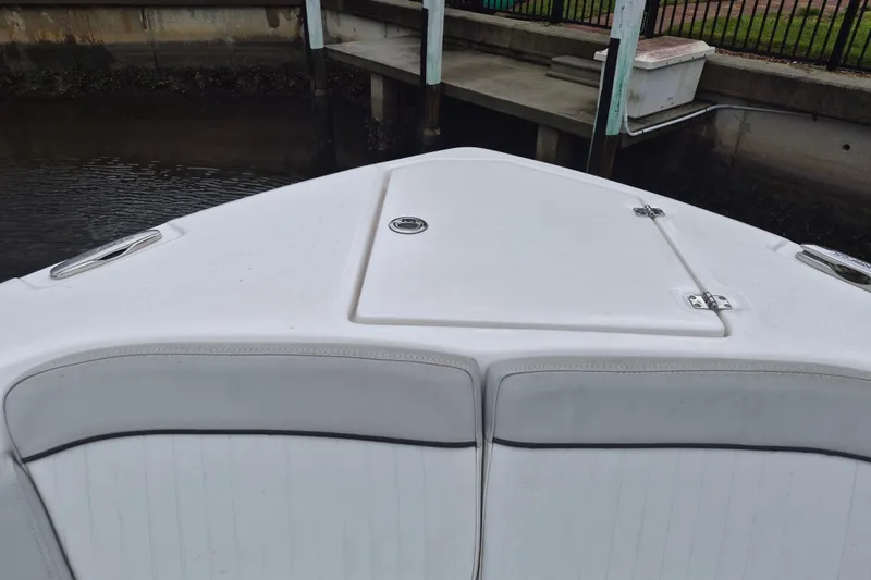 Slide: The Image of Bow of 2023 Sea Fox 268 Commander boat docked near a pier. - 10