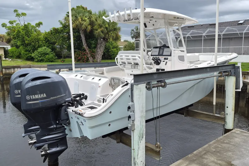 Slide: The Image of 2023 Sea Fox 268 Commander boat with Yamaha engines on a lift. - 4