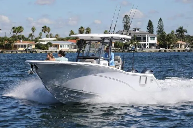 The Image of Manufacturer Provided Image: 2023 Sea Fox 268 Commander boat cruising on water near coastal homes. - 0