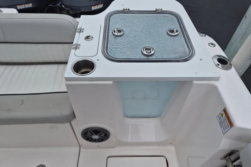 Slide: The Image of 2023 Sea Fox 268 Commander boat interior with seating and storage compartment. - 23