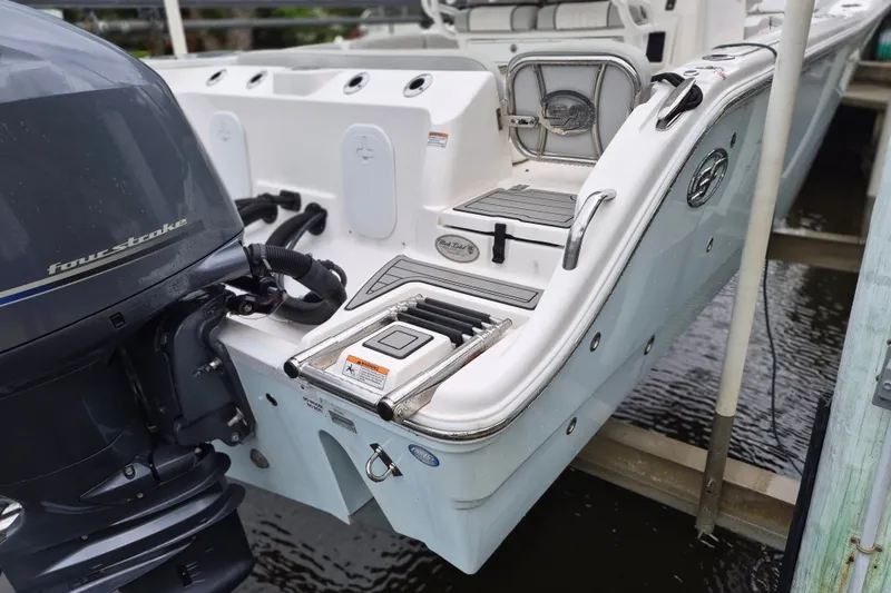 Slide: The Image of 2023 Sea Fox 268 Commander boat with four-stroke engine and swim platform ladder. - 7