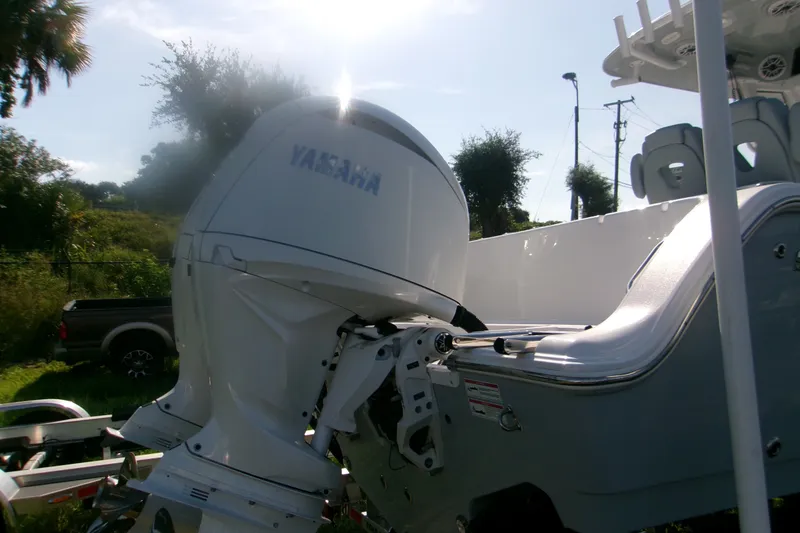 Slide: The Image of 2026 Sportsman Open 262 Center Console with Yamaha outboard engine in sunlight. - 3