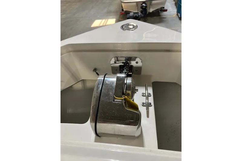 Slide: The Image of Anchor winch on 2021 Sailfish 272 CC boat, showcasing marine equipment. - 27