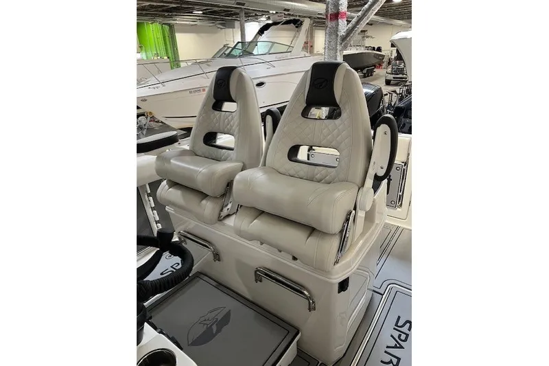 Slide: The Image of Luxurious seating on 2021 Sailfish 272 CC boat, featuring plush, ergonomic design. - 23
