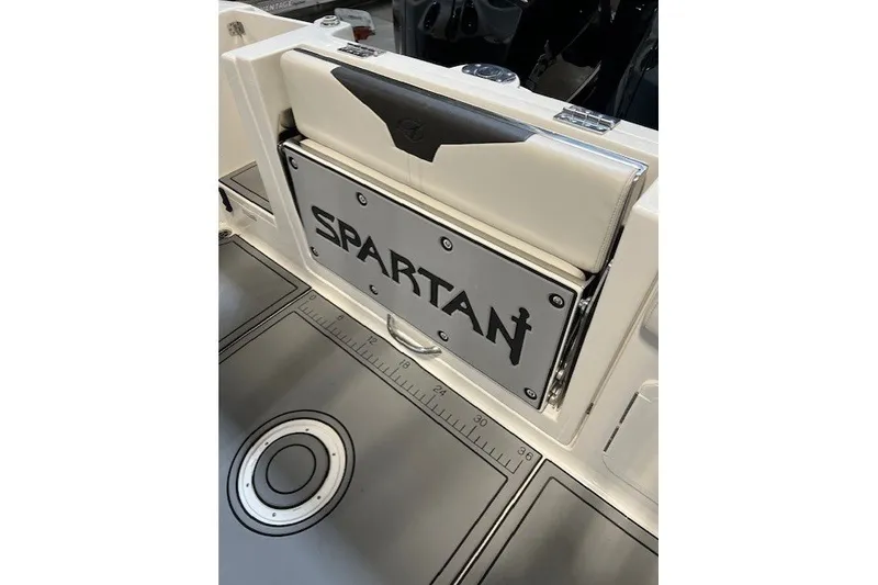 Slide: The Image of 2021 Sailfish 272 CC boat with "Spartan" branding and integrated measuring ruler. - 20