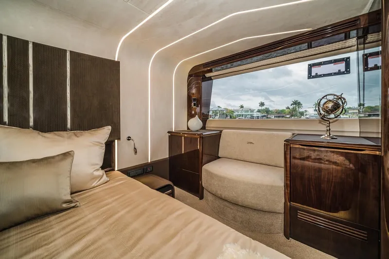 Slide: The Image of Luxurious interior of 2020 Galeon 680 Fly yacht with elegant wood finishes and plush seating. - 21