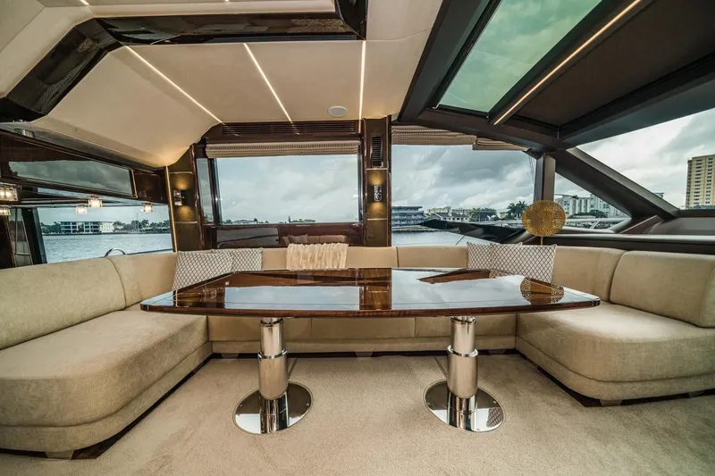 Slide: The Image of Luxurious interior of 2020 Galeon 680 Fly yacht with elegant seating and panoramic windows. - 14