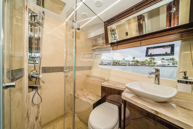 Slide: The Image of Luxurious bathroom on 2020 Galeon 680 Fly yacht with modern fixtures and ocean view. - 29