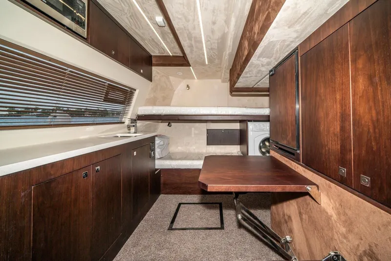 Slide: The Image of Luxurious interior of 2020 Galeon 680 Fly yacht with wood finishes and modern amenities. - 30