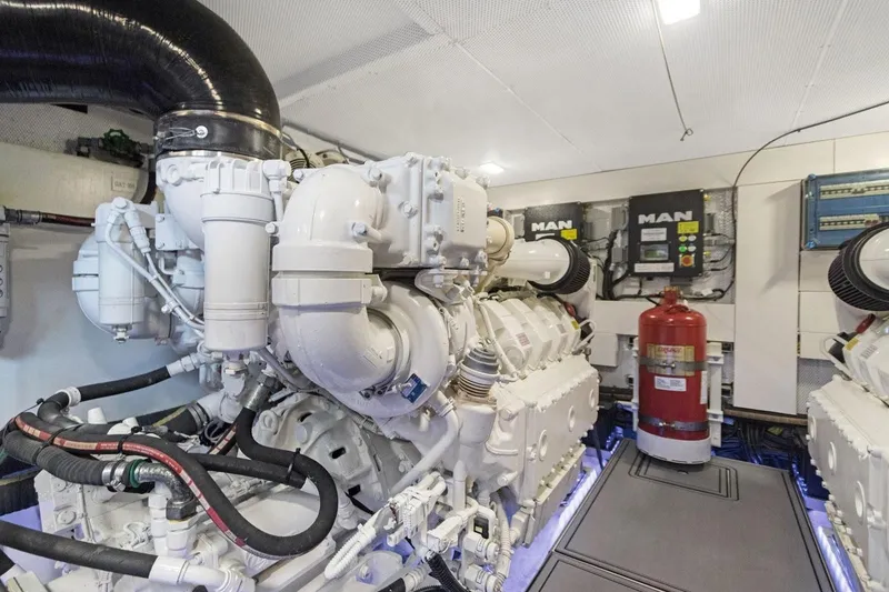 Slide: The Image of Engine room of 2020 Galeon 680 Fly yacht with MAN engines and fire extinguisher. - 34