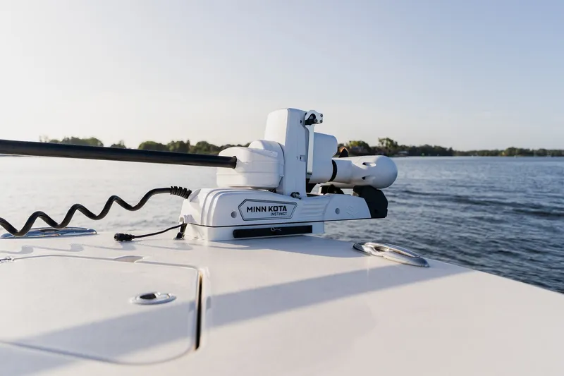 Slide: The Image of Minn Kota motor on Young 34 boat, 2023 model, on calm water. - 16