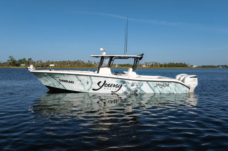 The Image of 2023 Young 34 boat on calm water, featuring Simrad electronics and stylish design. - 1