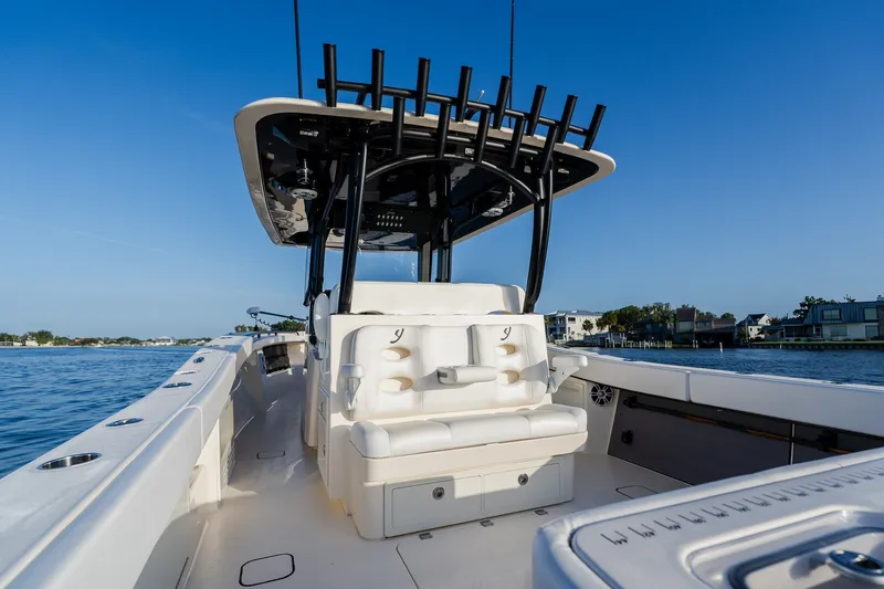 Slide: The Image of Modern 2023 Young 34 boat with sleek design on calm water. - 40
