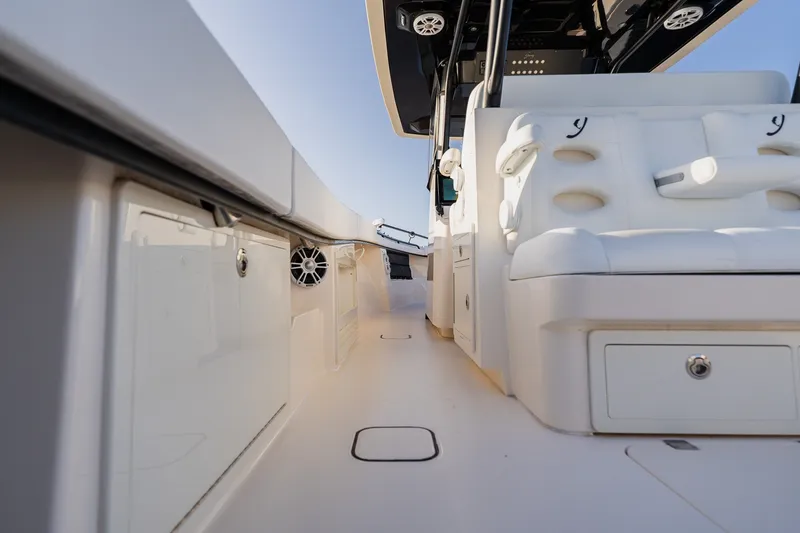 Slide: The Image of Luxurious 2023 Young 34 boat interior with sleek white seating and modern design. - 37