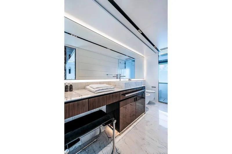 Slide: The Image of Luxurious bathroom interior on 2023 Riva 130' Bellissima yacht, featuring sleek design and marble finishes. - 40