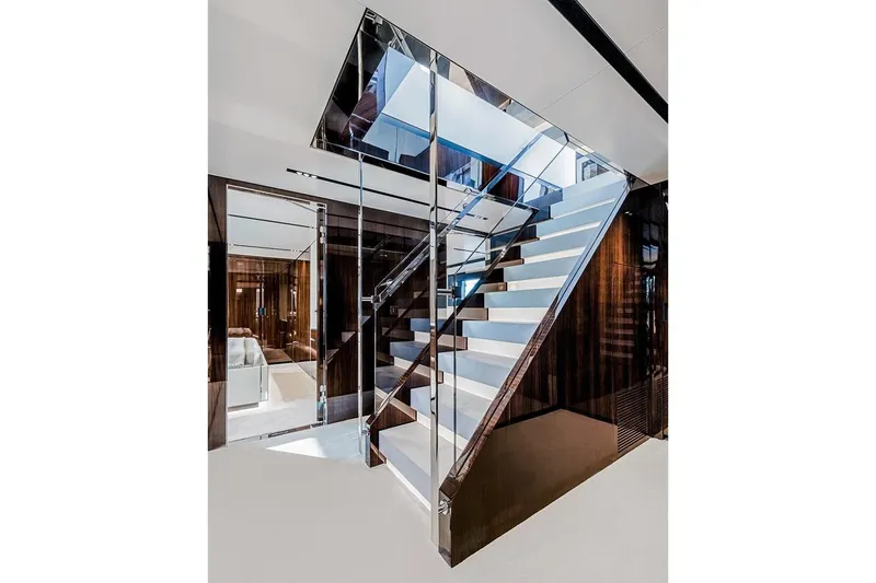Slide: The Image of Luxurious interior staircase of 2023 Riva 130' Bellissima yacht with modern design. - 42