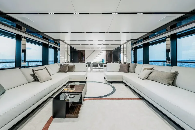 Slide: The Image of Luxurious interior of 2023 Riva 130' Bellissima yacht with elegant seating and ocean views. - 32