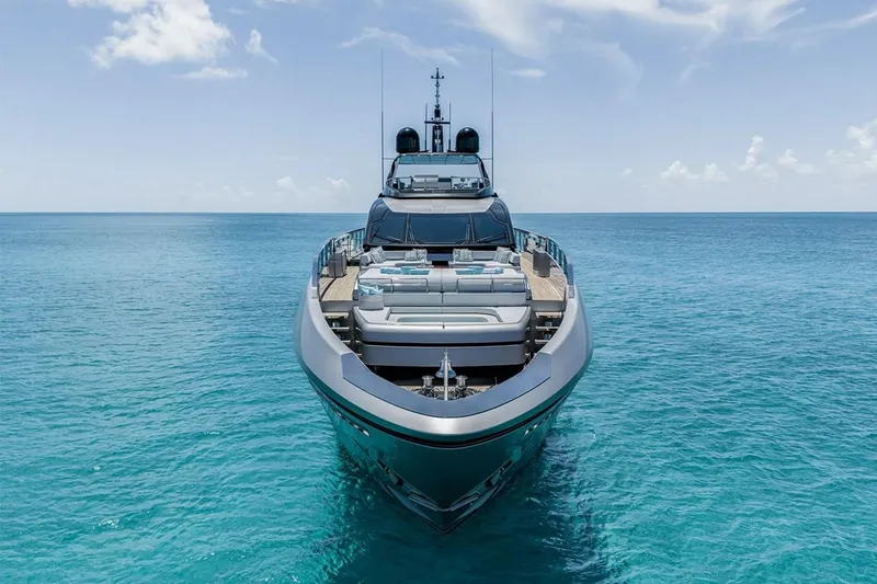 Slide: The Image of Luxury yacht Riva 130' Bellissima 2023 on clear blue ocean waters. - 9