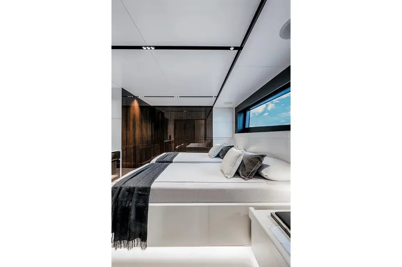 Slide: The Image of Luxurious bedroom interior on 2023 Riva 130' Bellissima yacht, featuring modern design and elegant decor. - 46