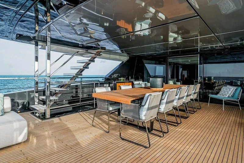 Slide: The Image of Luxurious deck of 2023 Riva 130' Bellissima yacht with elegant dining area. - 20