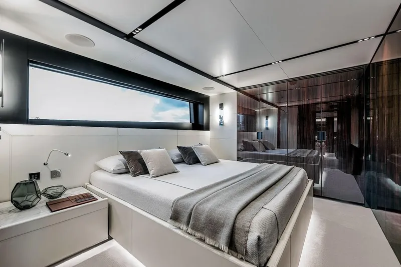 Slide: The Image of Luxurious bedroom interior of 2023 Riva 130' Bellissima yacht with modern design elements. - 44