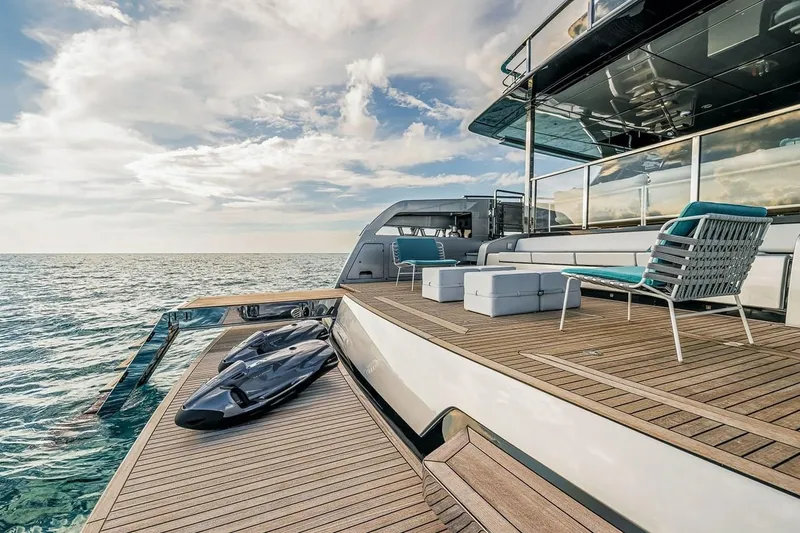 Slide: The Image of Luxurious 2023 Riva 130' Bellissima yacht deck with seating and sea view. - 14