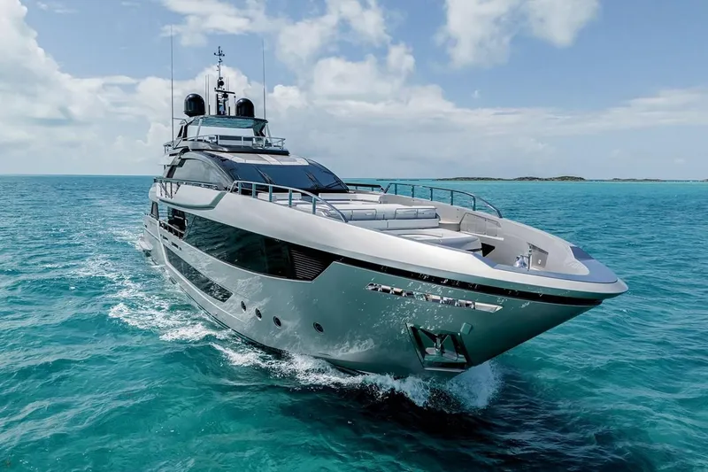 Slide: The Image of Luxurious 2023 Riva 130' Bellissima yacht cruising on turquoise ocean waters. - 8