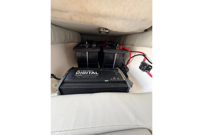 Slide: The Image of Battery compartment of 2020 Sea Fox 249 Avenger with Minn Kota digital charger. - 19