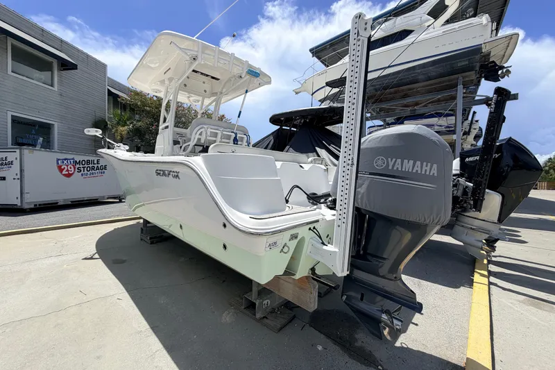 Slide: The Image of 2020 Sea Fox 249 Avenger boat with Yamaha engine in storage facility. - 32