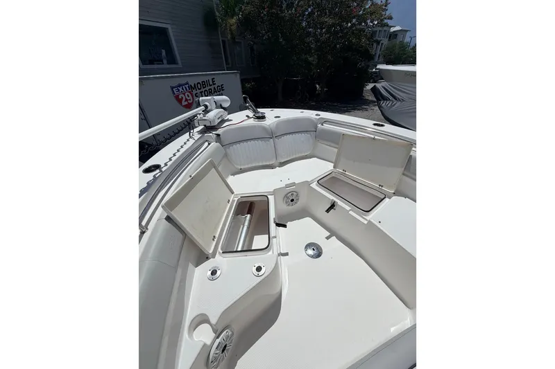 Slide: The Image of 2020 Sea Fox 249 Avenger boat interior with open storage compartments. - 14