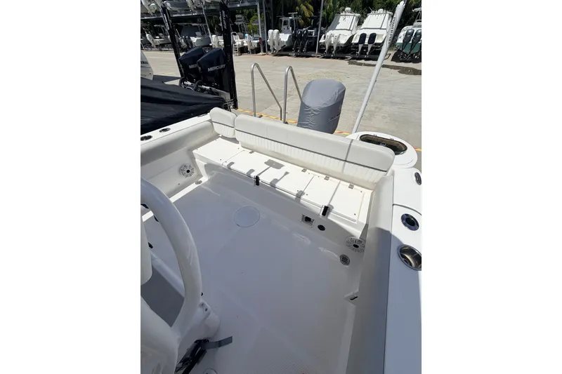 Slide: The Image of 2020 Sea Fox 249 Avenger boat interior with seating and storage compartments. - 30