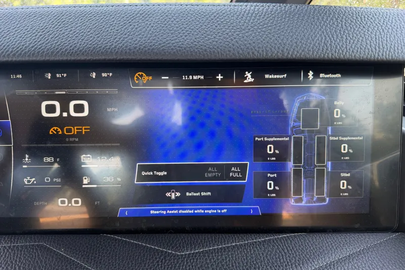 Slide: The Image of 2026 Nautique Super Air Nautique G25 dashboard display showing speed, ballast, and system settings. - 27