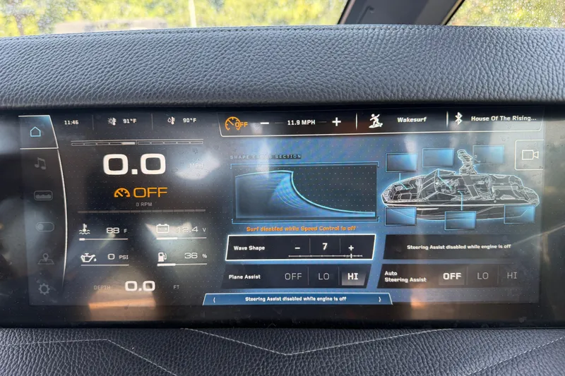 Slide: The Image of 2026 Nautique Super Air Nautique G25 dashboard displaying speed, wave shape, and steering assist settings. - 28