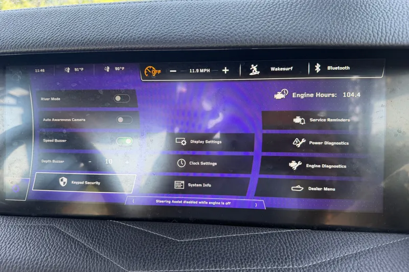 Slide: The Image of 2026 Nautique Super Air Nautique G25 dashboard displaying various settings and engine diagnostics. - 29