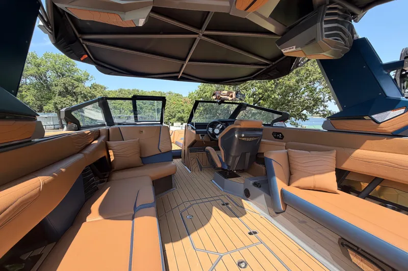Slide: The Image of 2026 Nautique Super Air Nautique G25 interior with luxurious seating and modern design. - 25