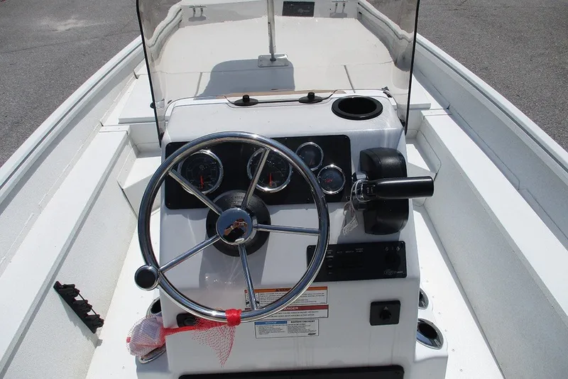 Slide: The Image of Steering console of 2026 G3 Bay 17 boat with gauges and controls. - 24