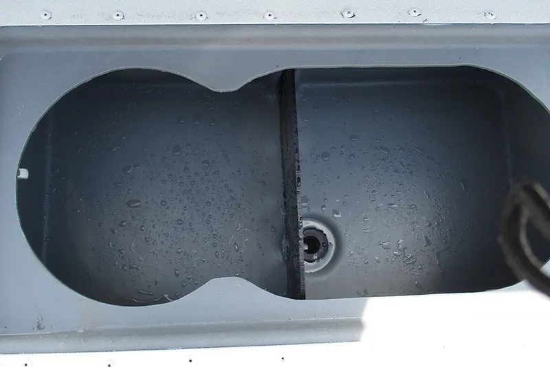 Slide: The Image of Open compartment of G3 Bay 17 boat, 2026 model, with water droplets inside. - 17