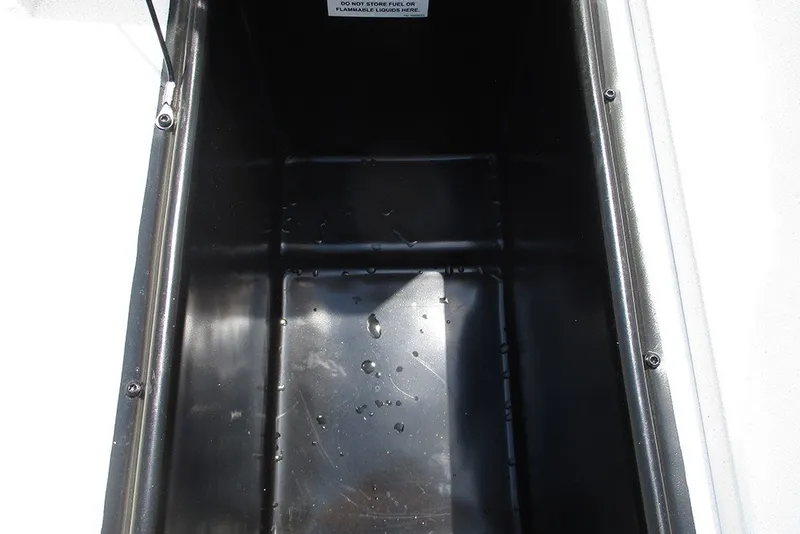 Slide: The Image of Empty storage compartment in 2026 G3 Bay 17 boat with water droplets inside. - 14