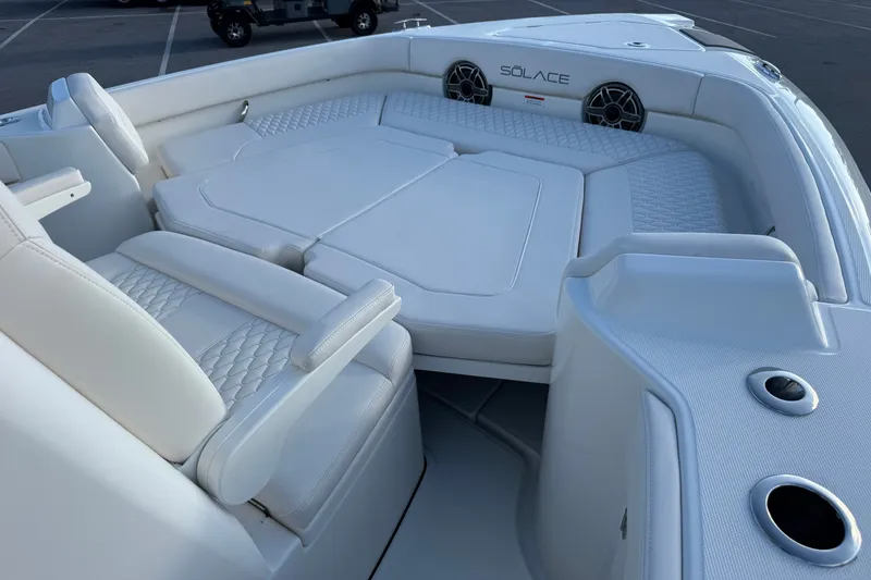 Slide: The Image of Luxurious interior of 2027 Solace 28HCS boat with plush seating and modern design. - 25