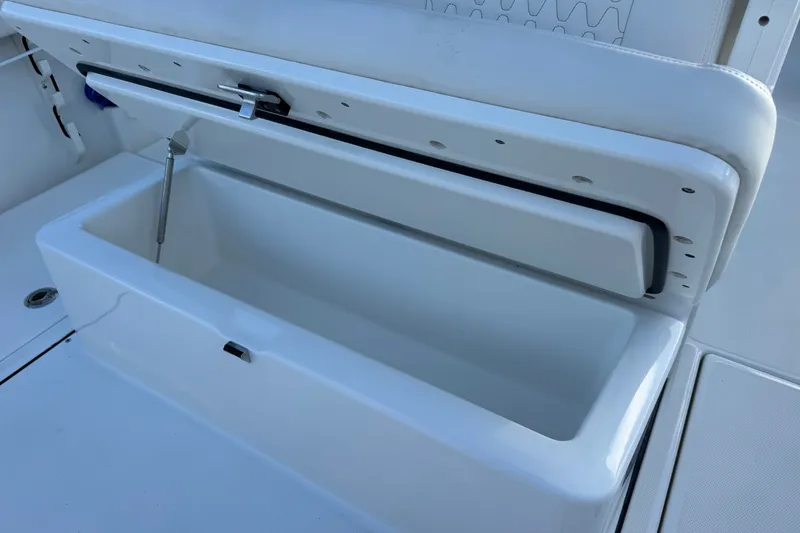 Slide: The Image of Open storage compartment on 2027 Solace 28HCS boat, showcasing interior space. - 16