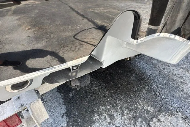 Slide: The Image of 2019 Sea Hunt BX22BR boat hull detail on trailer, showing sleek design and construction. - 7