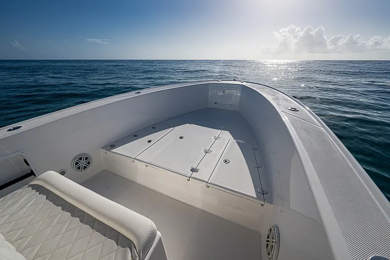 Slide: The Image of 2019 Ocean Master 296 boat deck with ocean view under clear sky. - 5